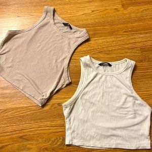 2 Basic white and beige cropped tank tops.